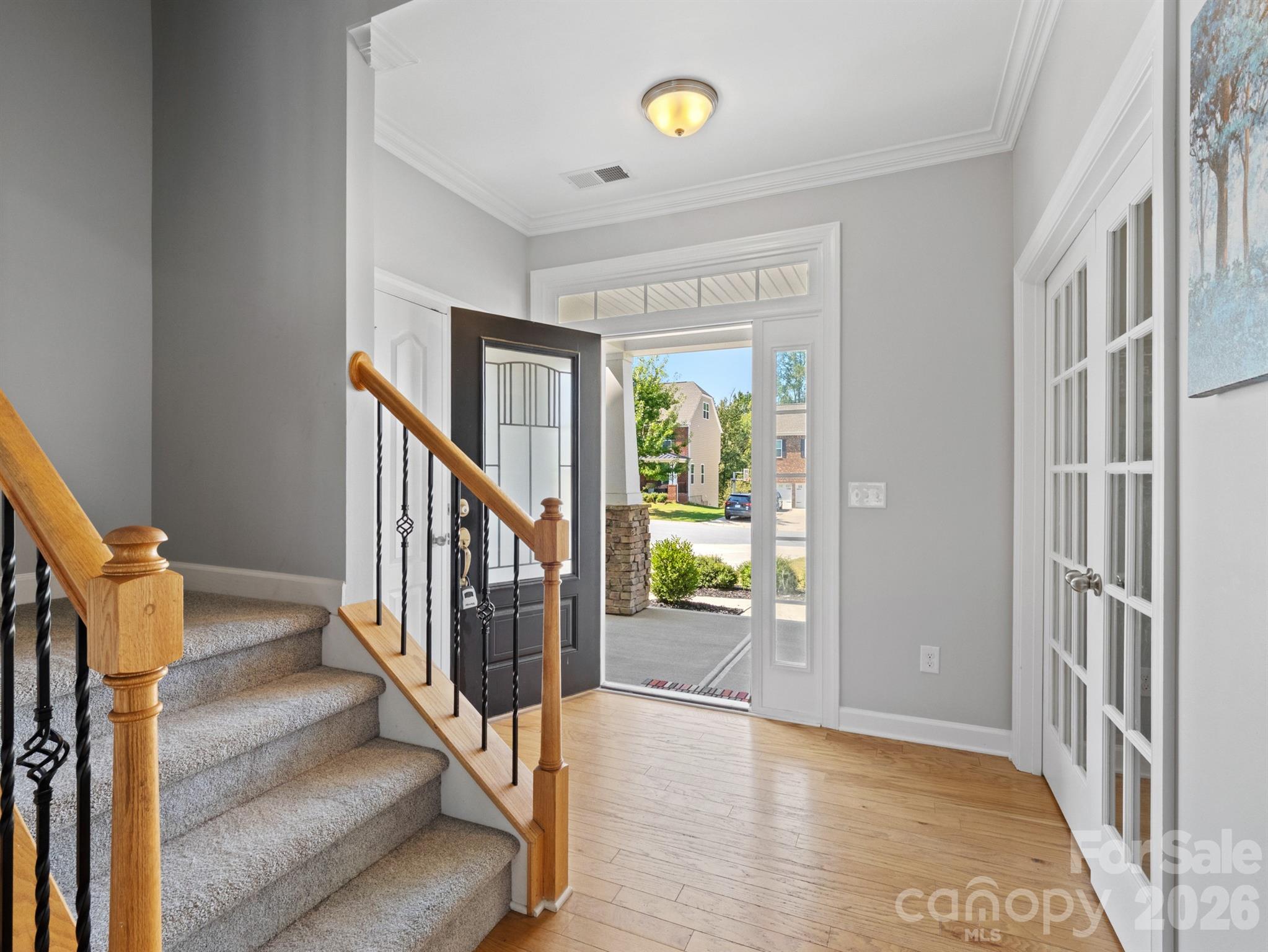 1982 Smokey Quartz Road Davidson, NC 28036 - Photo 4 of 43 a view of an entryway with wooden floor