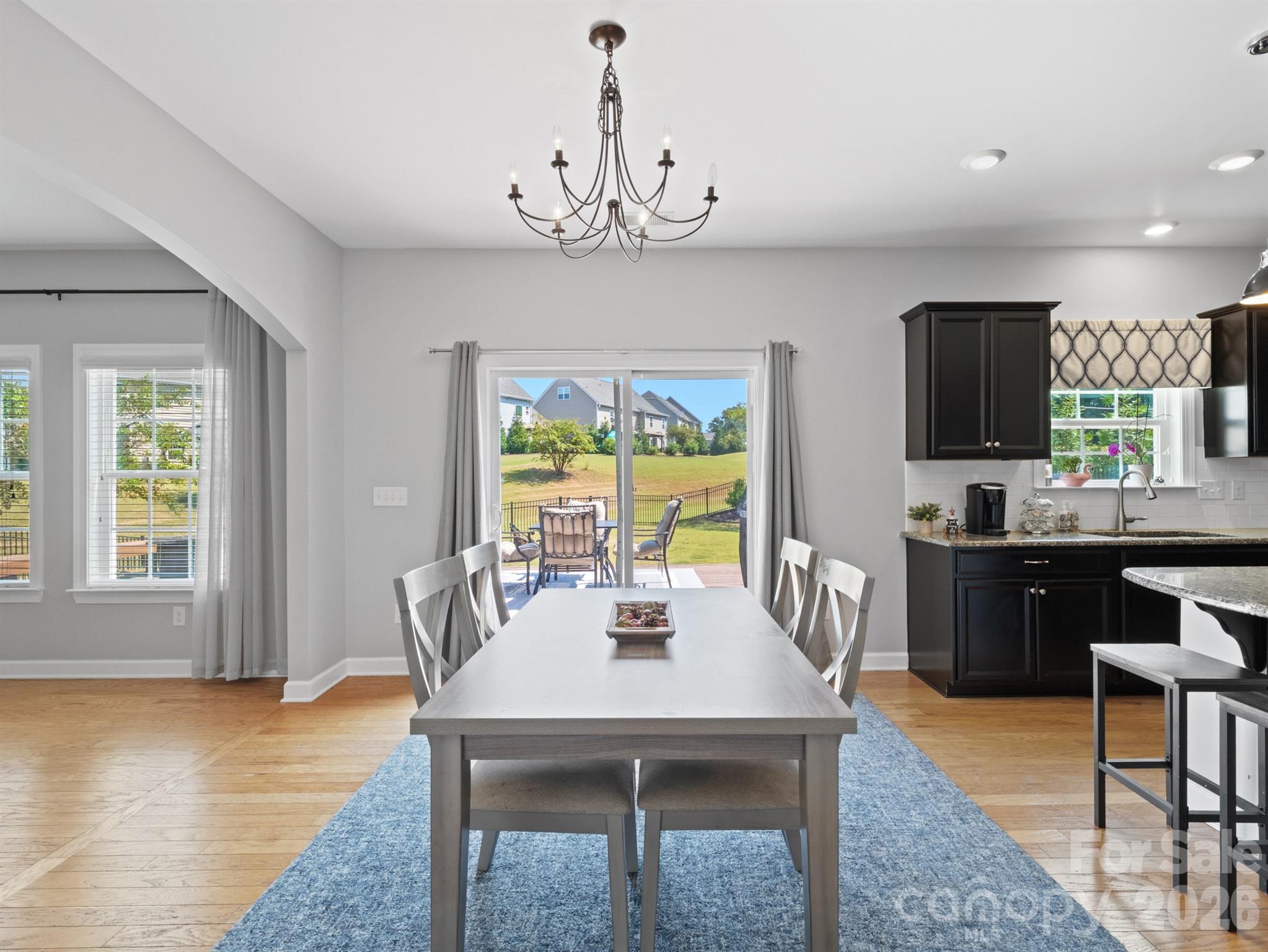 1982 Smokey Quartz Road Davidson, NC 28036 - Photo 10 of 43 a view of a dining room with furniture window and outside view
