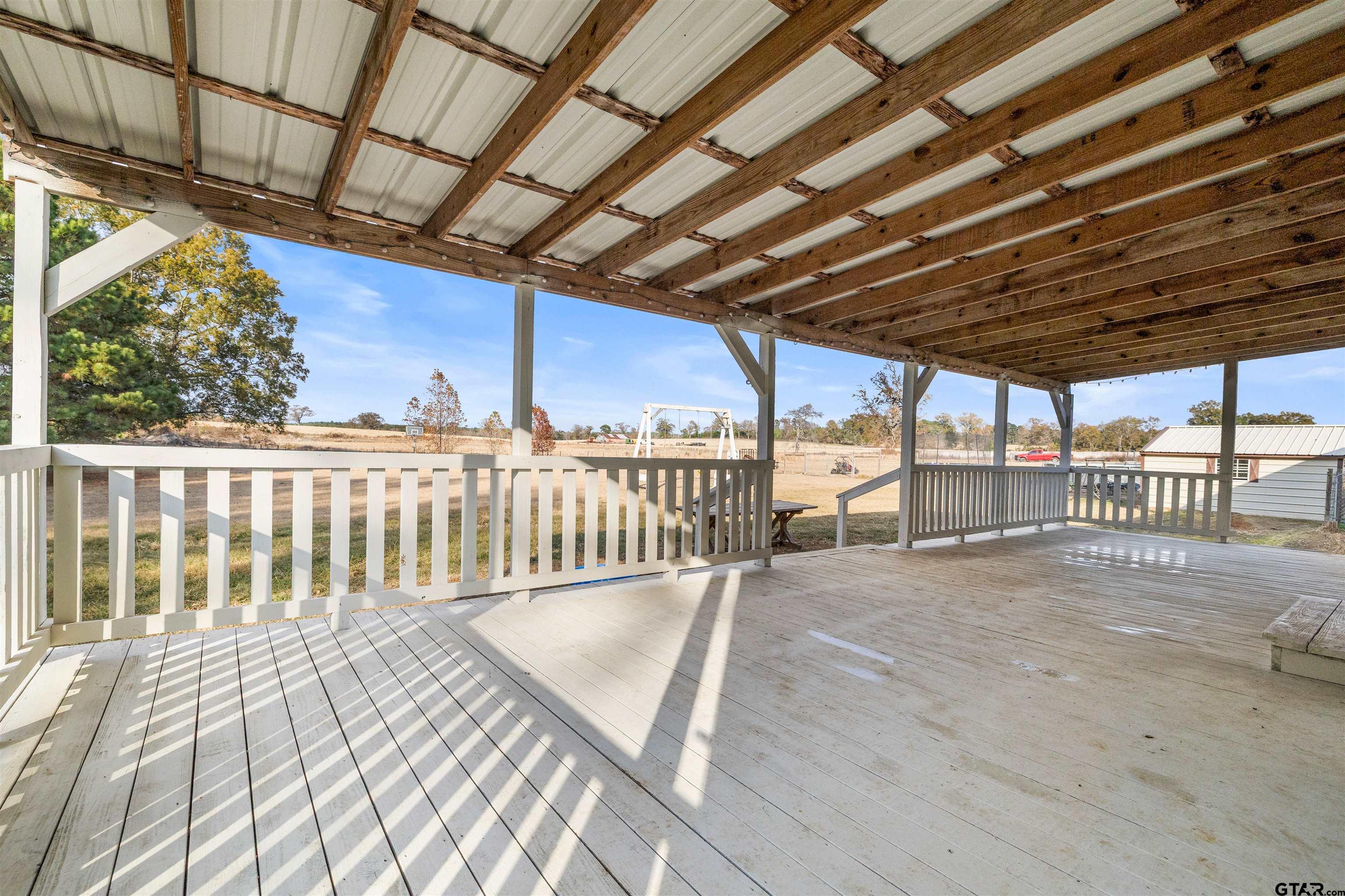 2089 Cottonwood Road Gilmer, TX 75645 - Photo 24 of 30 a view of a porch