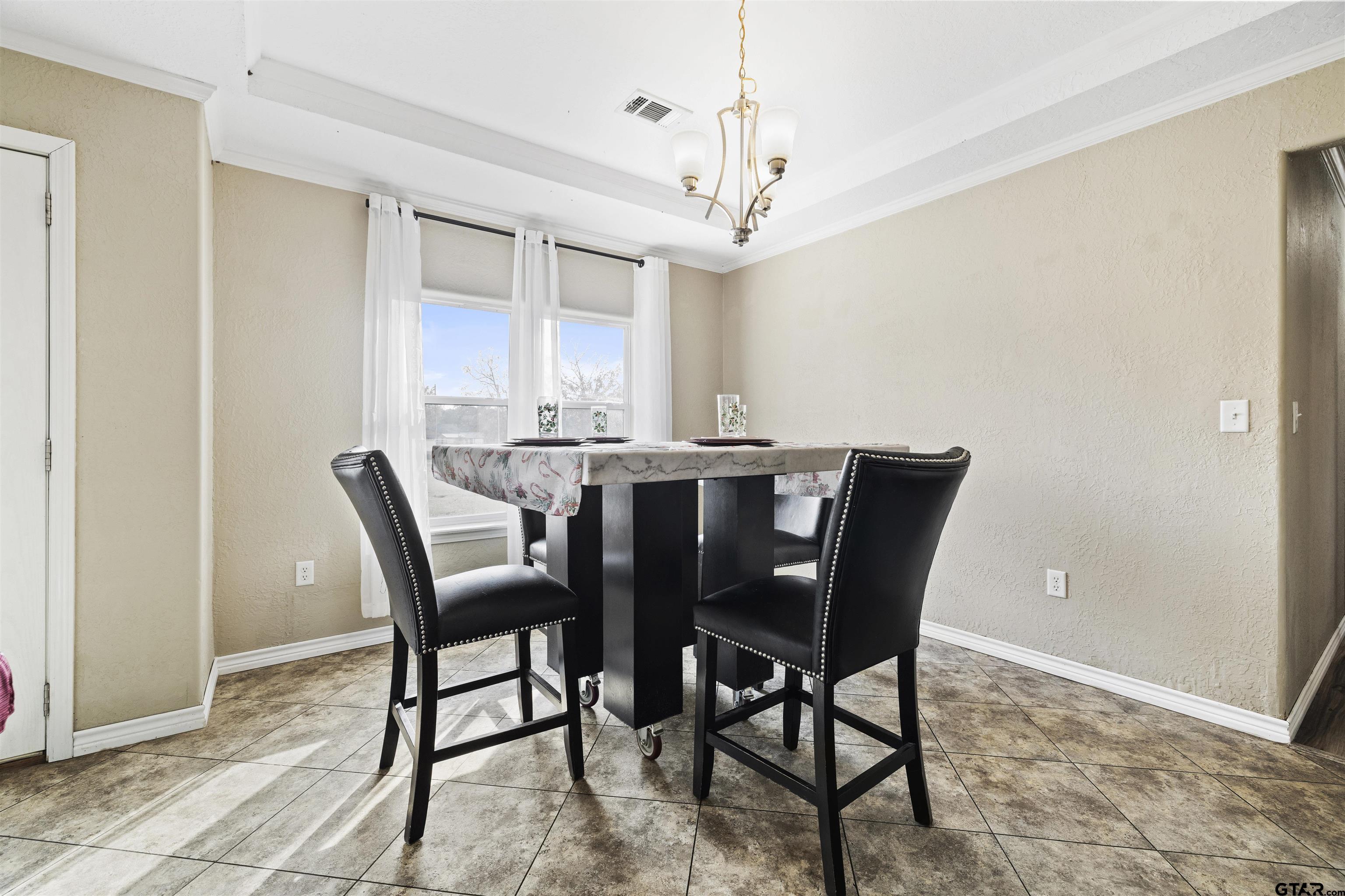 2089 Cottonwood Road Gilmer, TX 75645 - Photo 8 of 30 a view of a dining room with furniture