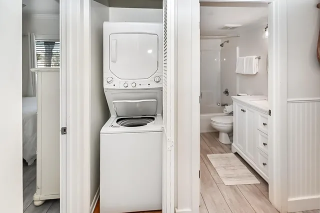 a view of a bathroom with a washer and dryer