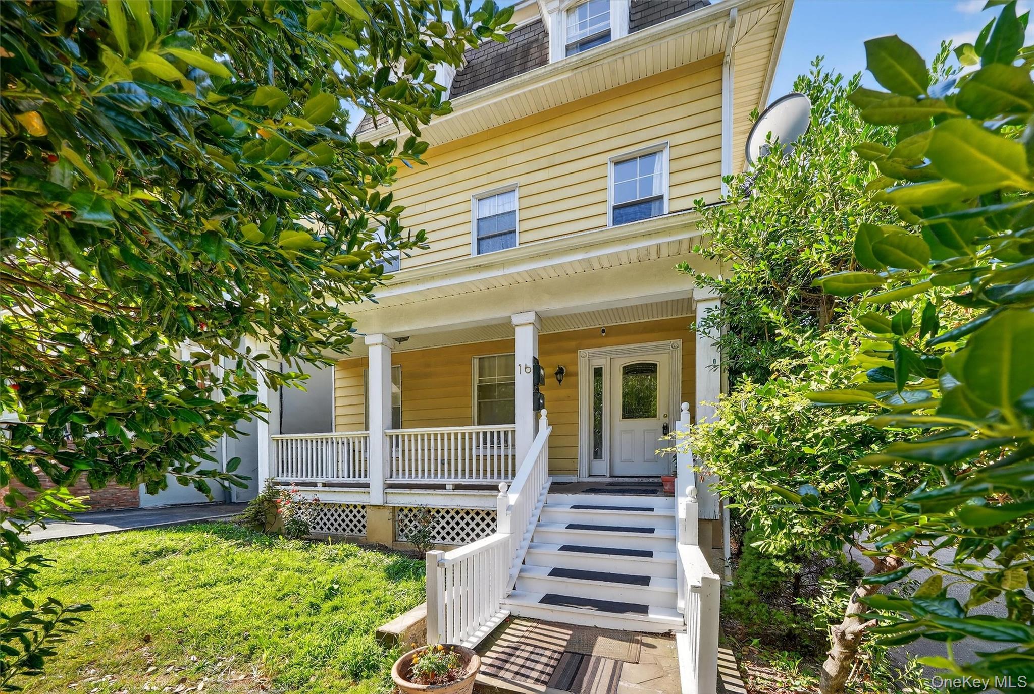 16 Maple Place Ossining, NY 10562 - Photo 1 of 45 front view of a house with a yard
