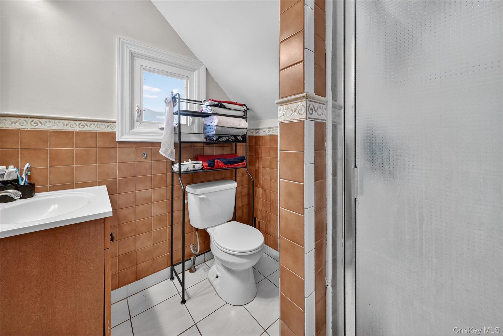 16 Maple Place Ossining, NY 10562 - Photo 14 of 45 a bathroom with a toilet and a sink