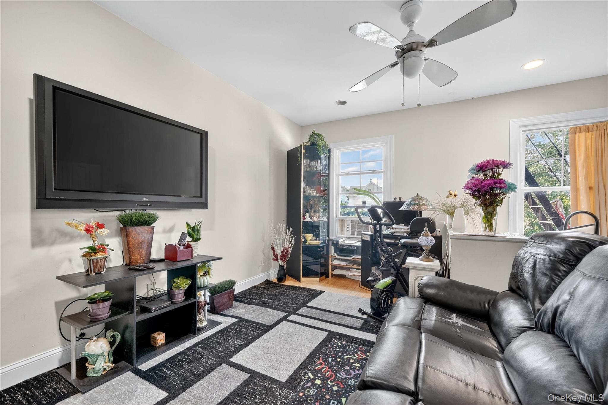 16 Maple Place Ossining, NY 10562 - Photo 17 of 45 a living room with furniture and a flat screen tv