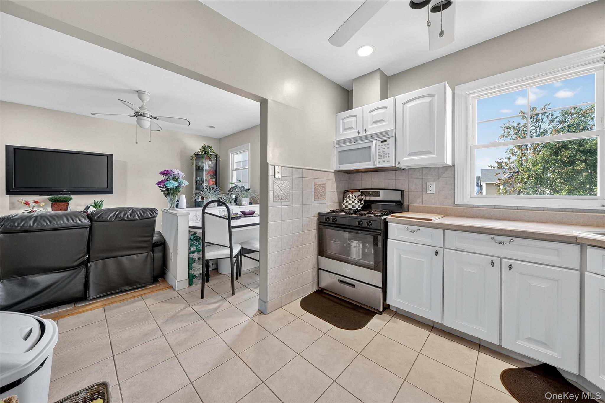 16 Maple Place Ossining, NY 10562 - Photo 23 of 45 a kitchen with a sink cabinets and window