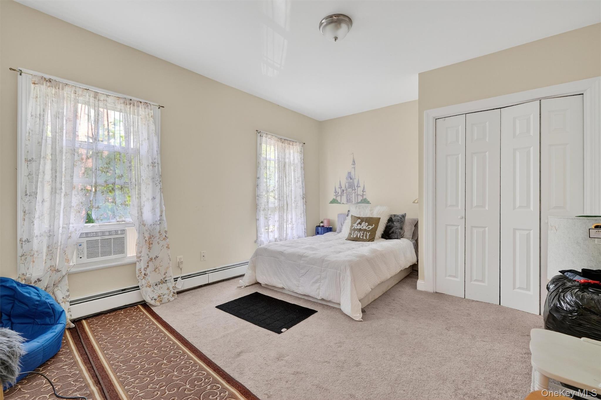 16 Maple Place Ossining, NY 10562 - Photo 24 of 45 a bedroom with a bed and a window