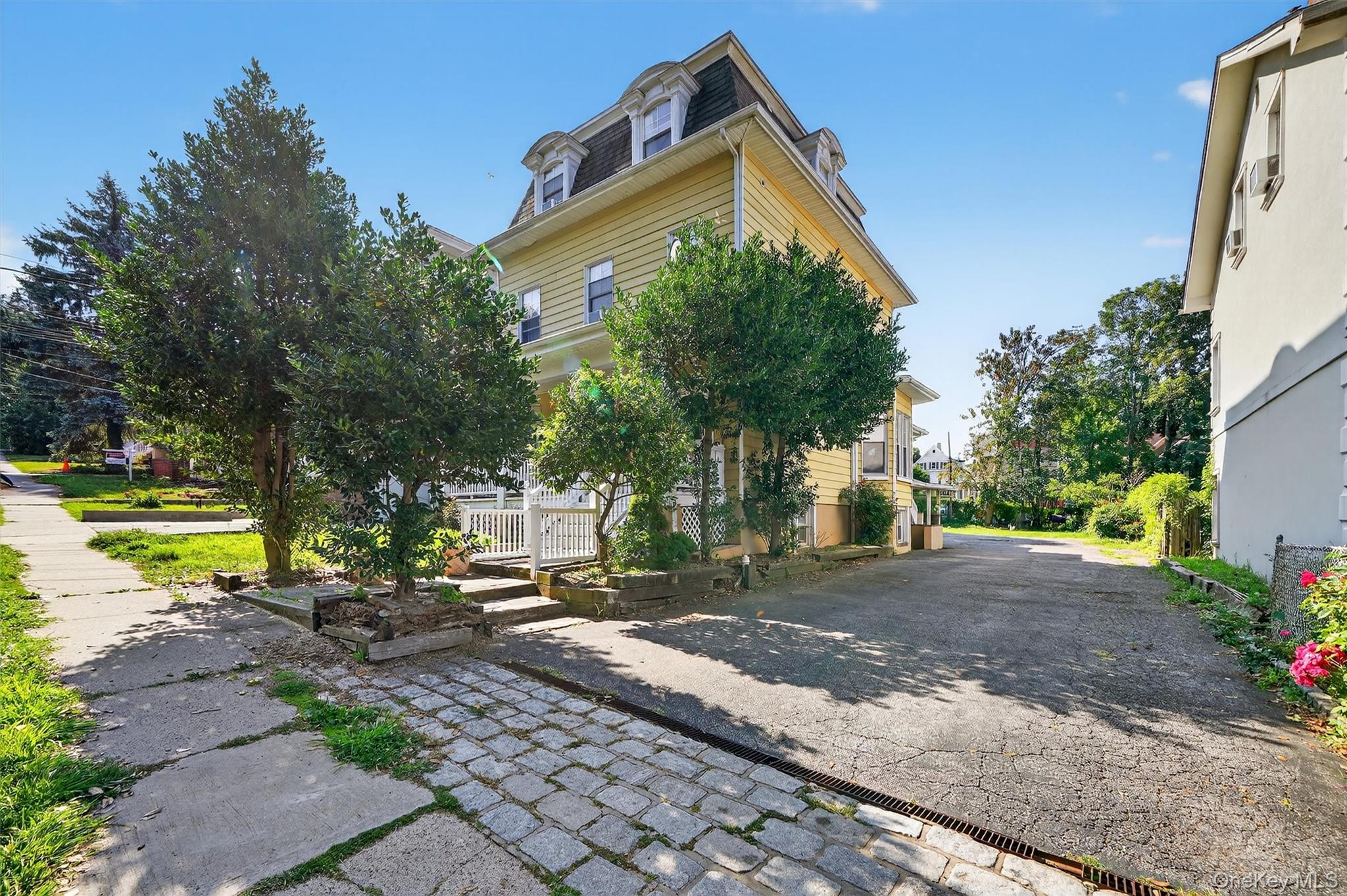 16 Maple Place Ossining, NY 10562 - Photo 3 of 45 a view of a house with a yard
