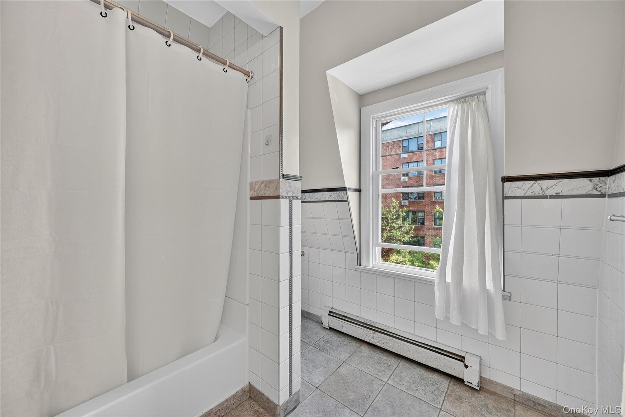 16 Maple Place Ossining, NY 10562 - Photo 35 of 45 a bathroom with a shower