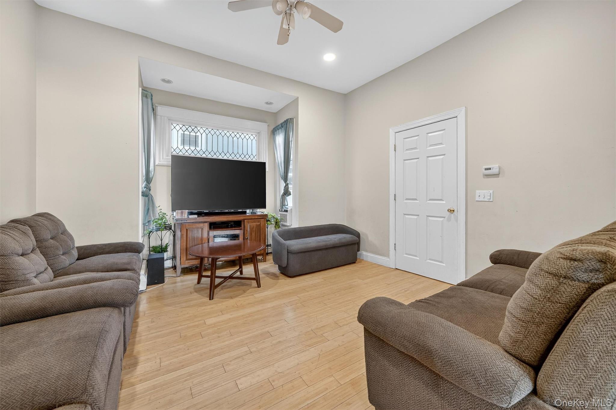 16 Maple Place Ossining, NY 10562 - Photo 4 of 45 a living room with furniture and a flat screen tv