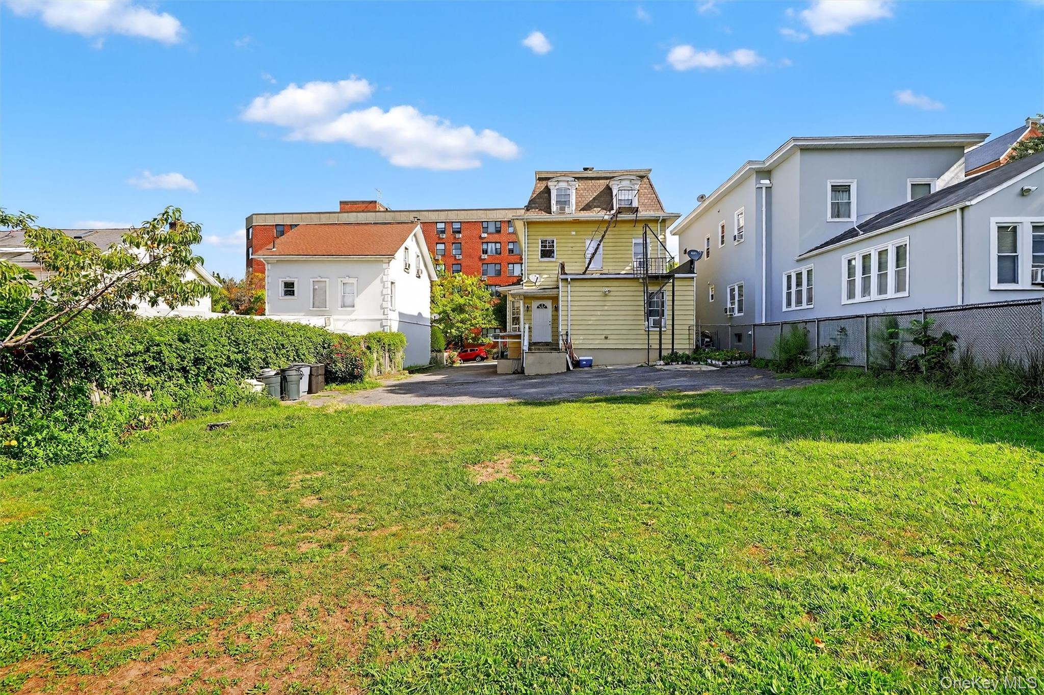 16 Maple Place Ossining, NY 10562 - Photo 41 of 45 a view of a house with a big yard