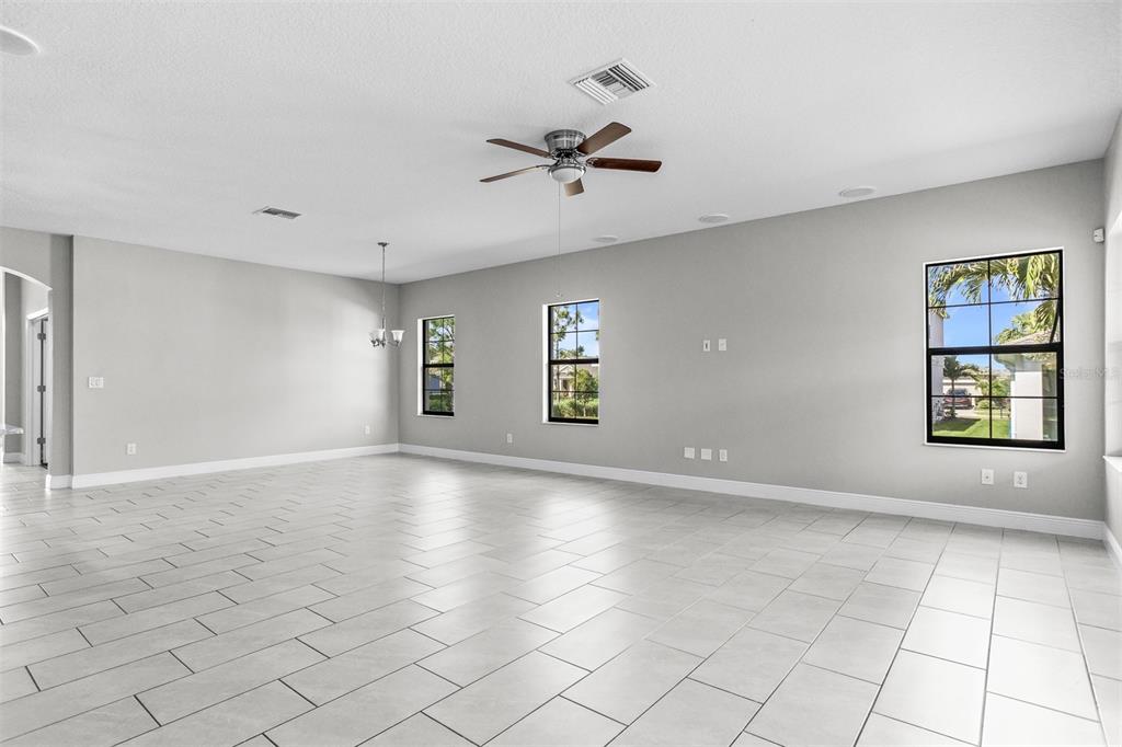 6906 Paradiso Drive Apollo Beach, FL 33572 - Photo 12 of 37 a view of an empty room with a window