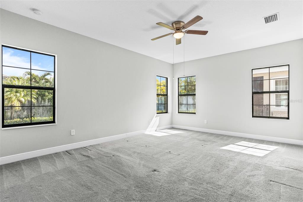 6906 Paradiso Drive Apollo Beach, FL 33572 - Photo 26 of 37 a view of an empty room with a window