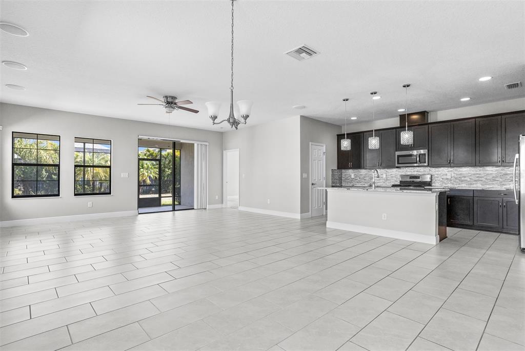6906 Paradiso Drive Apollo Beach, FL 33572 - Photo 4 of 37 a view of kitchen and window