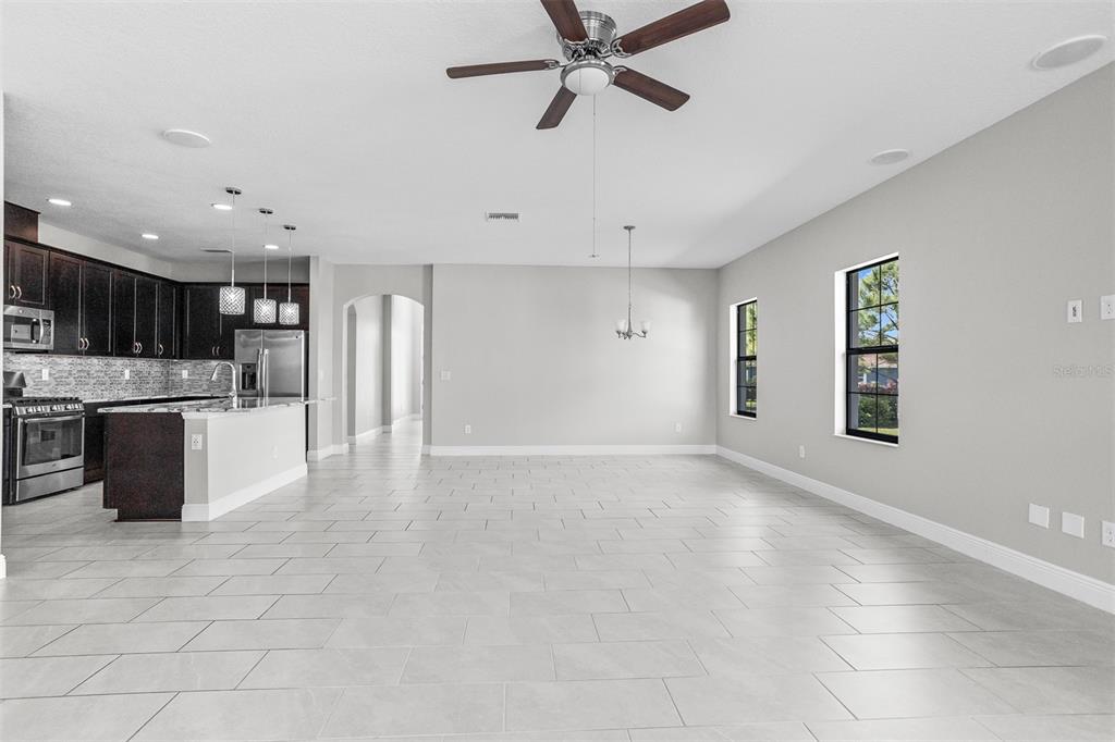 6906 Paradiso Drive Apollo Beach, FL 33572 - Photo 10 of 37 a view of a kitchen with a sink and a window