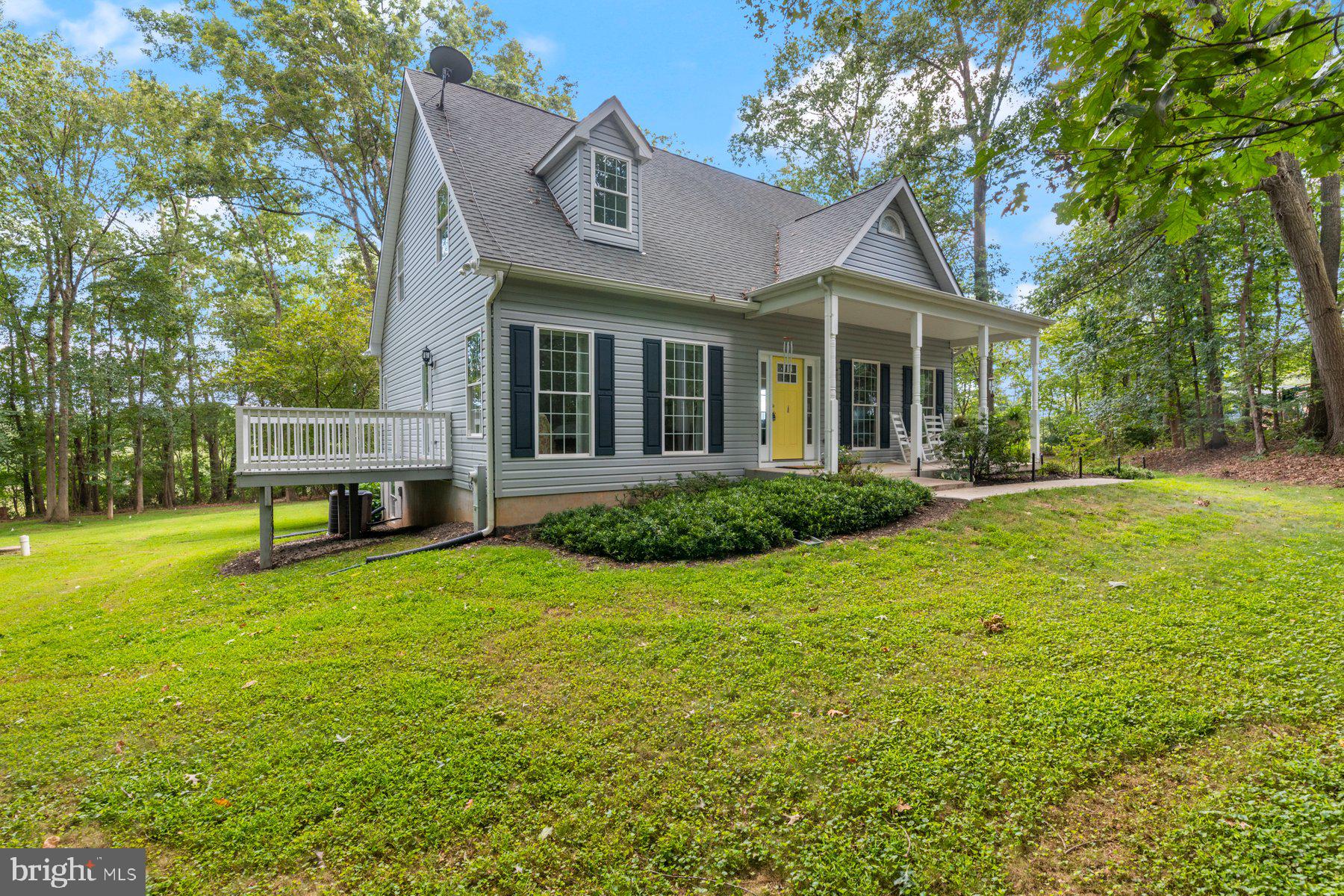 1012 Bernoudy Road White Hall, MD 21161 - Photo 2 of 28 a view of a house with a big yard and large trees