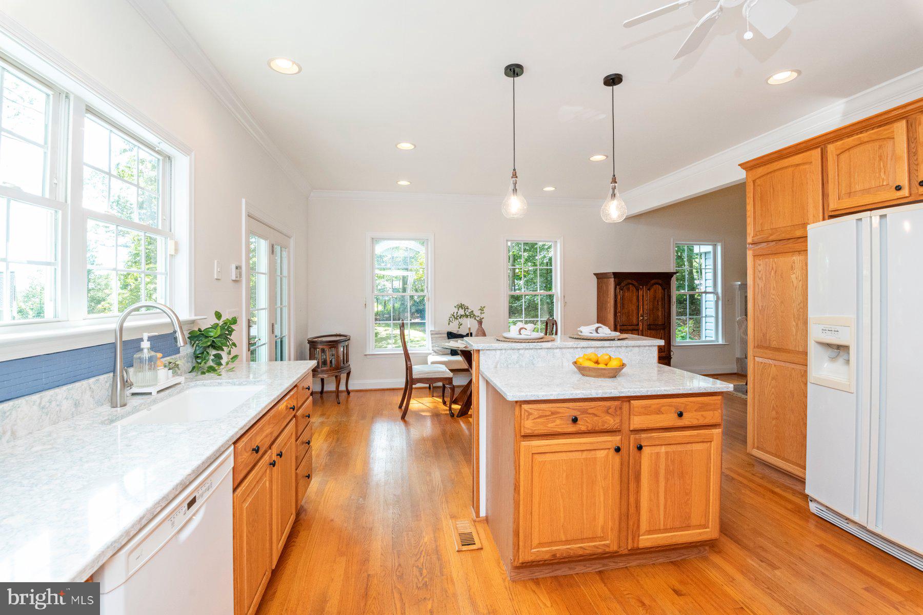 1012 Bernoudy Road White Hall, MD 21161 - Photo 8 of 28 a large kitchen with a large window and stainless steel appliances