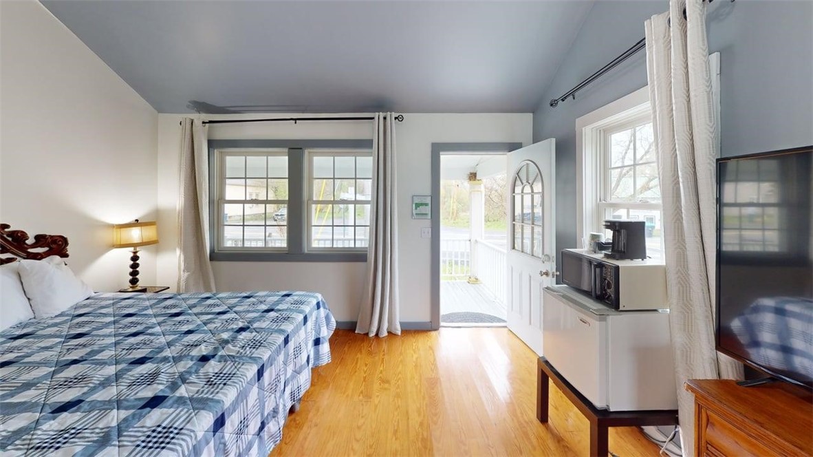 7667 State Highway Springfield Center, NY 13468 - Photo 16 of 50 Suite 5 Enjoy plenty of light, TV, mini fridge, mi