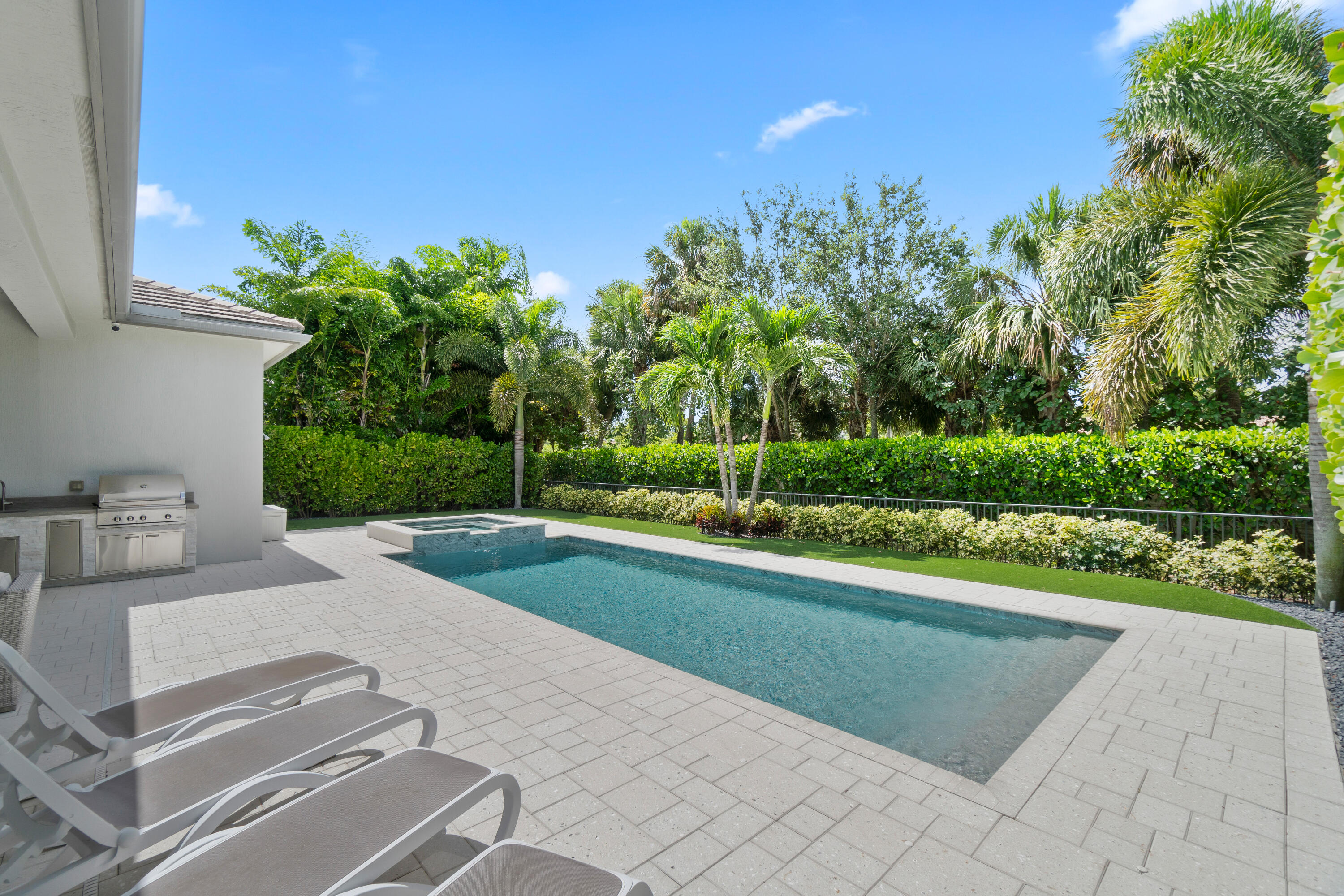 2620 Northwest 69th Street Boca Raton, FL 33496 - Photo 33 of 55 Oversized Saltwater Heated Pool