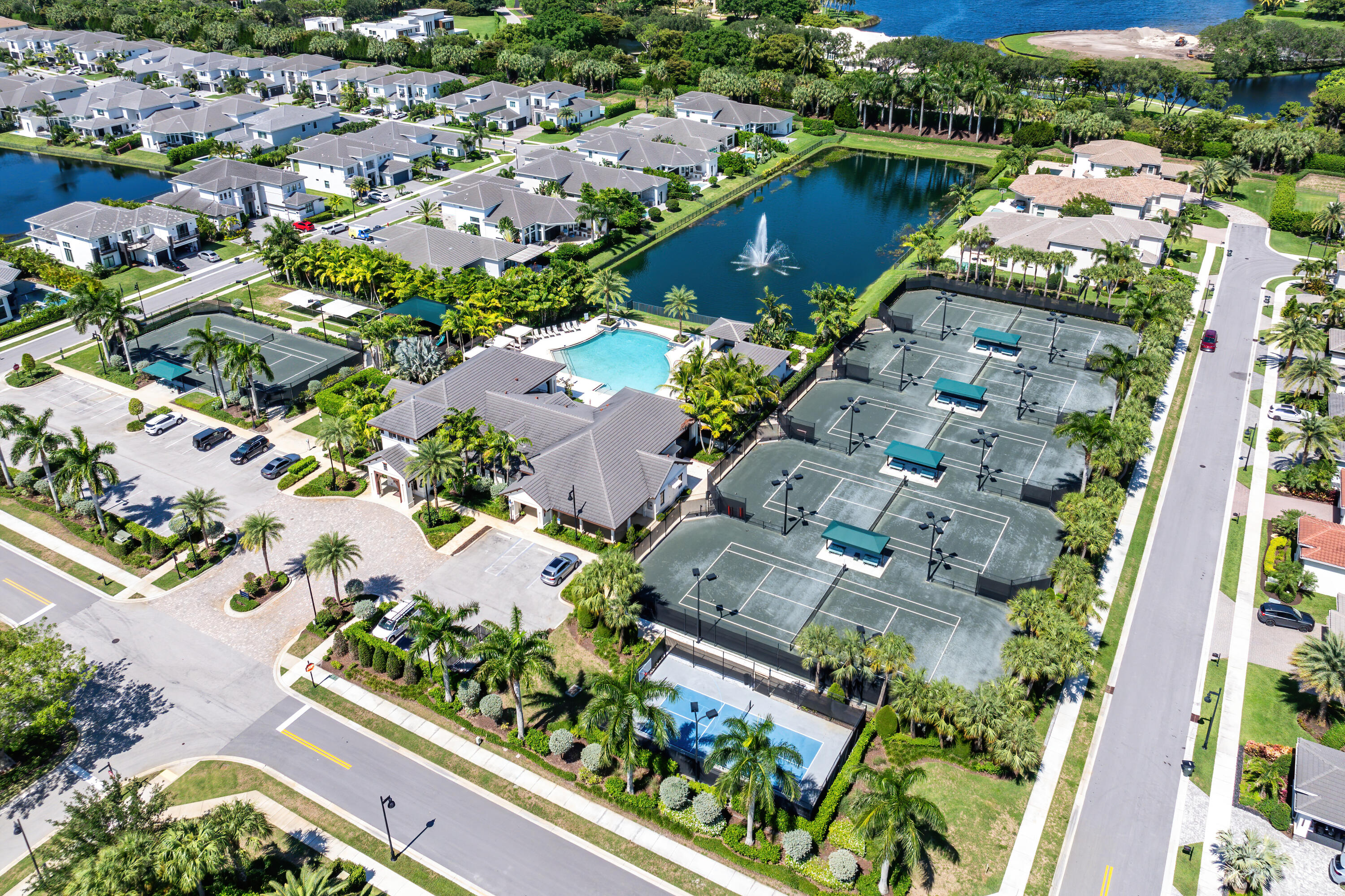 2620 Northwest 69th Street Boca Raton, FL 33496 - Photo 41 of 55 Clubhouse with Pool and Tennis Courts