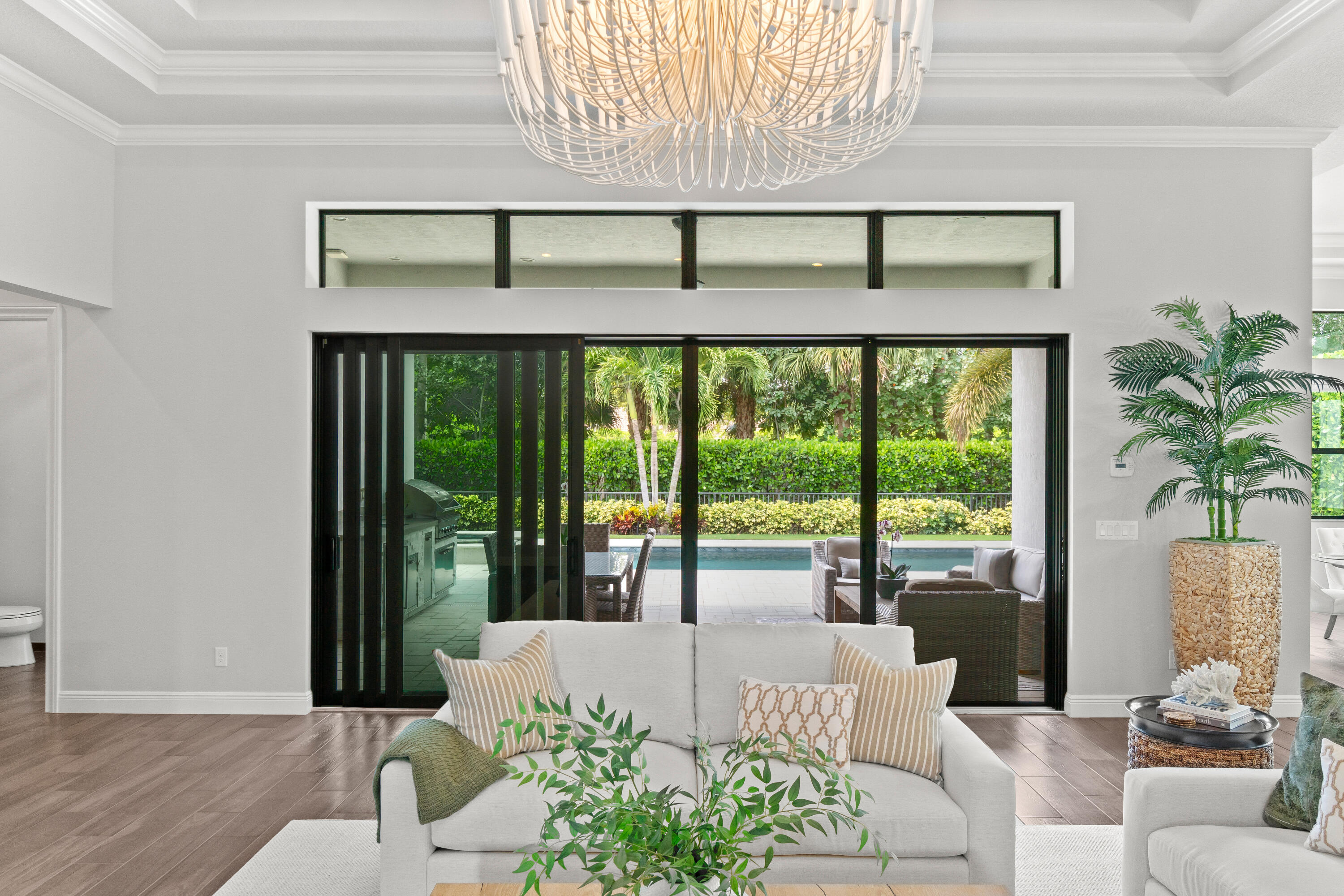 2620 Northwest 69th Street Boca Raton, FL 33496 - Photo 6 of 55 Living Room overlooking pool