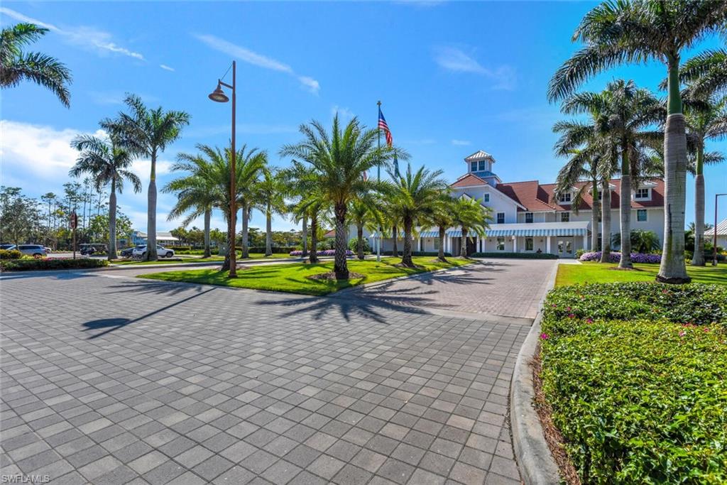 7242 Saona Court Naples, FL 34113 - Photo 26 of 34 a view of a park with palm trees
