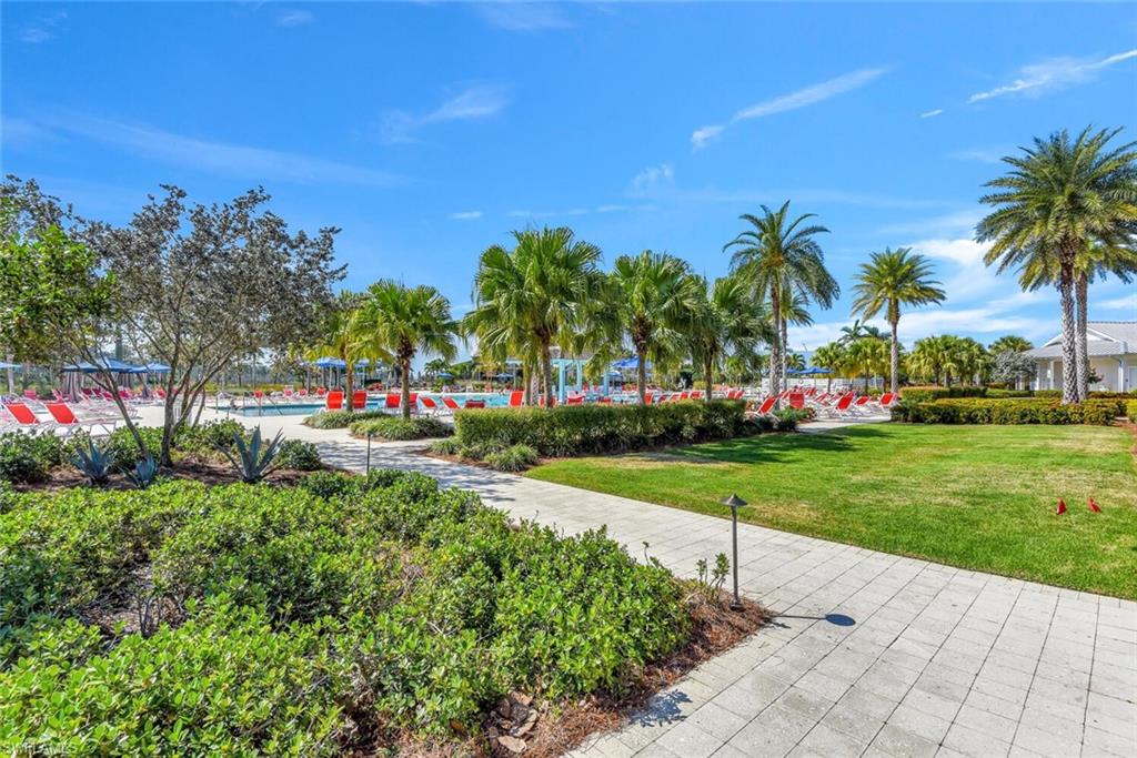 7242 Saona Court Naples, FL 34113 - Photo 30 of 34 a view of a park with palm trees