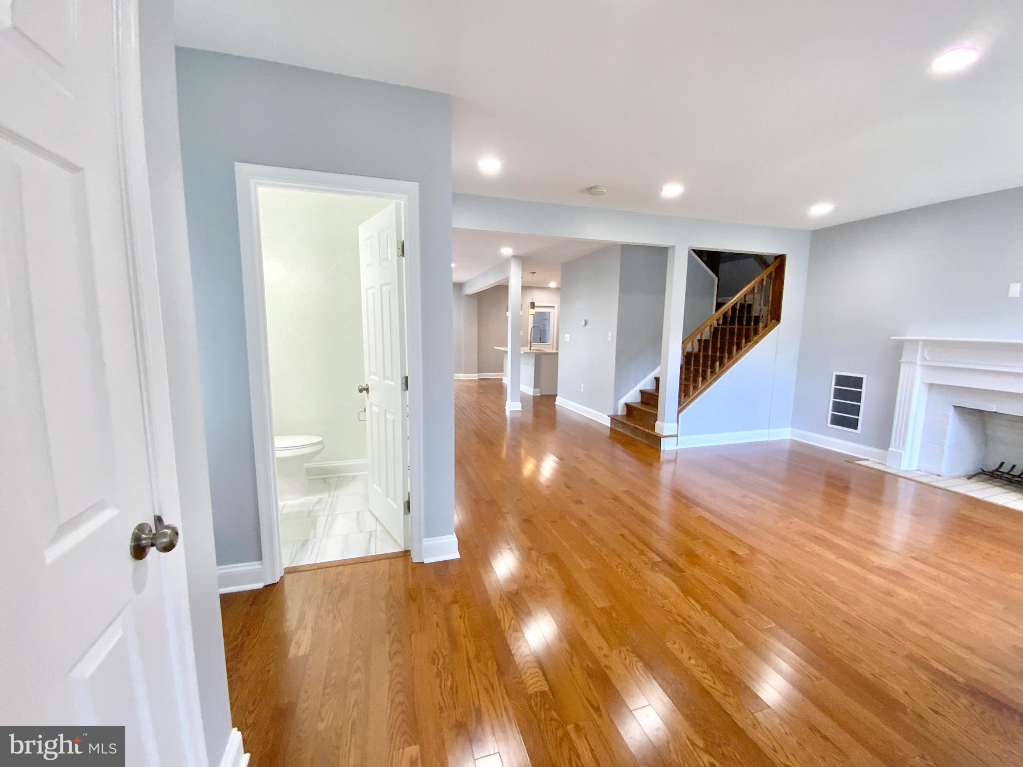 1318 Ingraham Street Northwest Washington, DC 20011 - Photo 13 of 35 a view of a hallway with wooden floor