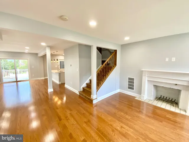 a view of a hallway with staircase
