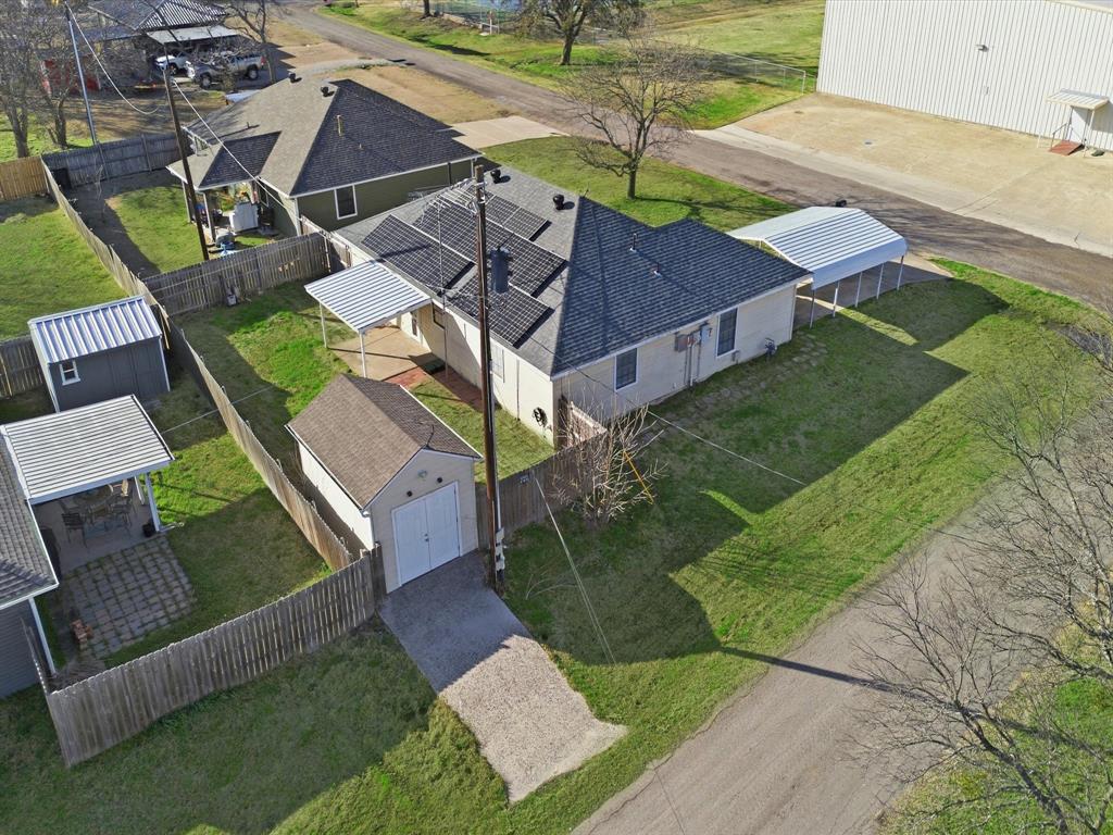 701 College Street Celeste, TX 75423 - Photo 27 of 29 an aerial view of a house with garden space and street view