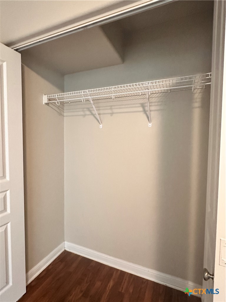 264 Trestle Tree, Unit A San Marcos, TX 78666 - Photo 4 of 17 a view of a room with racks on the wall