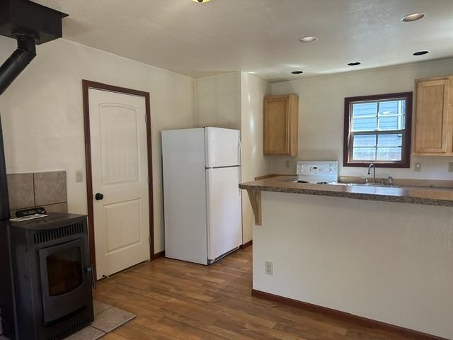 673 Minaret Road June Lake, CA 93529 - Photo 11 of 22 Kitchen featuring wood-finish flooring and recessed lighting