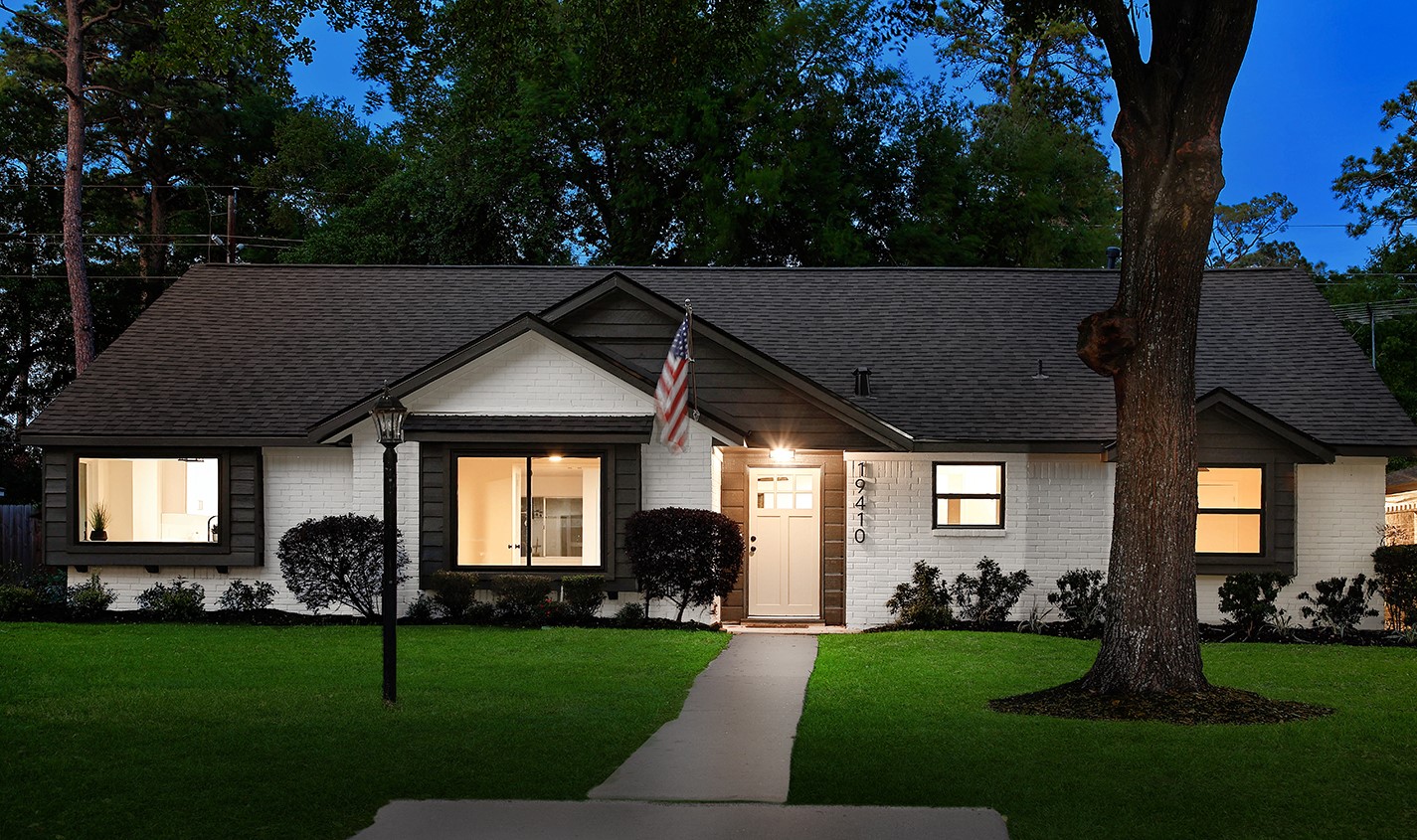 19410 Craigchester Lane Spring, TX 77388 - Photo 1 of 32 Welcome to 19410 Craigchester Lane, renovations done by CORNERSTONE CONSTRUCTION, transformed this home to a modern, standout on the street and enhancing the curb appeal with new landscaping and lighting.