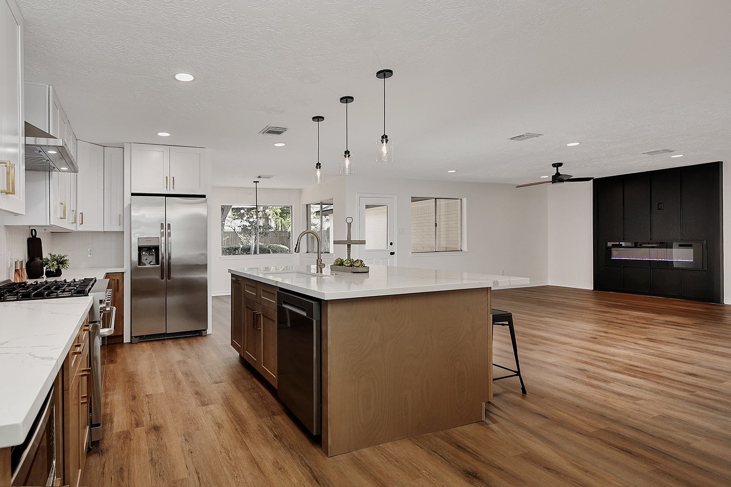19410 Craigchester Lane Spring, TX 77388 - Photo 11 of 32 All new stainless steel appliances include gas range/cooktop with vent hood, dishwasher, microwave and side-by-side refrigerator.
