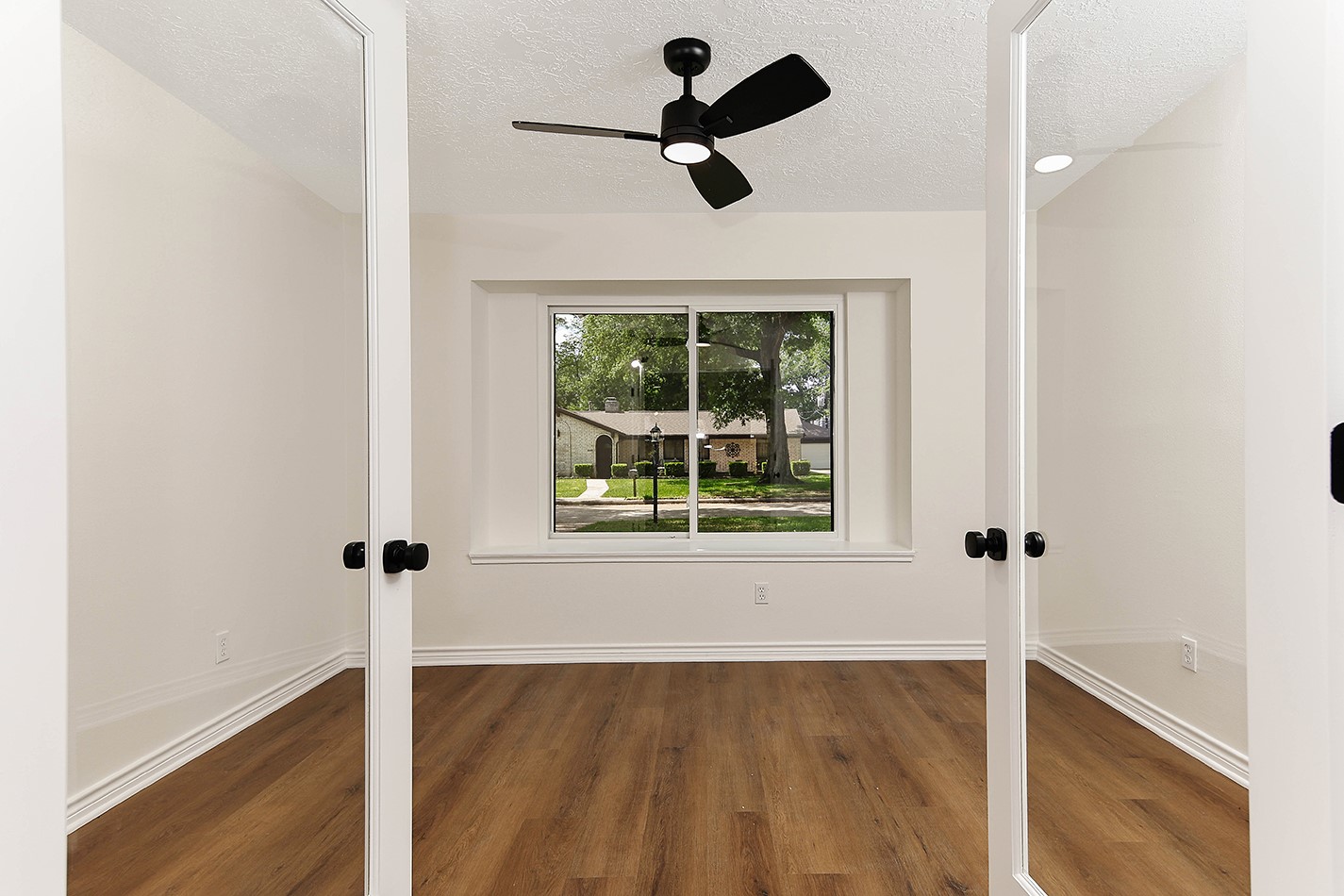 19410 Craigchester Lane Spring, TX 77388 - Photo 19 of 32 The addition of a private home office gives modern families another much-needed space in their home. New all glass double doors allow for sound control with minimal obstructed views to the open concept design.