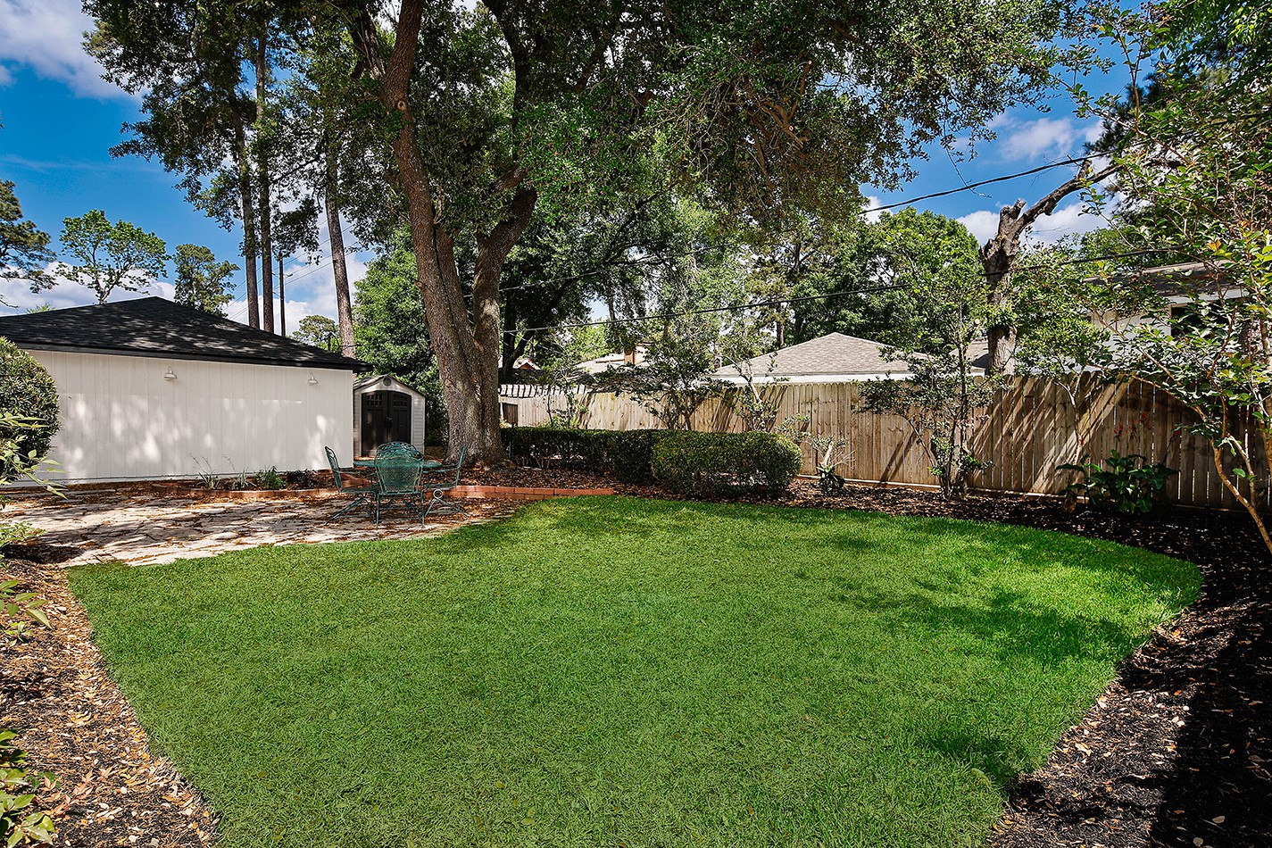19410 Craigchester Lane Spring, TX 77388 - Photo 32 of 32 Flagstone patio adds rustic charm in backyard.
