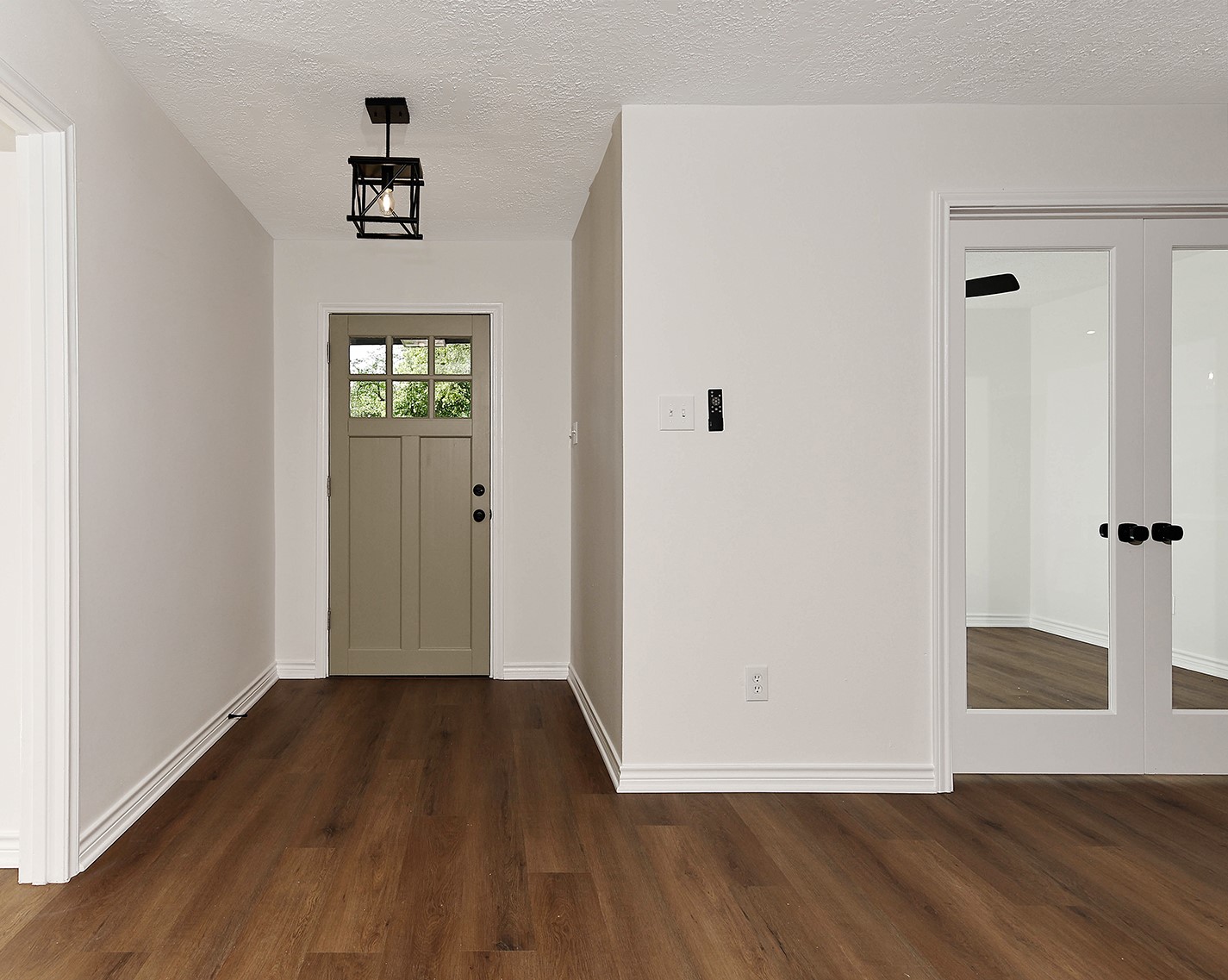 19410 Craigchester Lane Spring, TX 77388 - Photo 5 of 32 All new interior has high end modern finishes and designer colors throughout including luxury vinyl wood plank floors in all rooms (except baths), adding warmth, texture, and character to this family home.