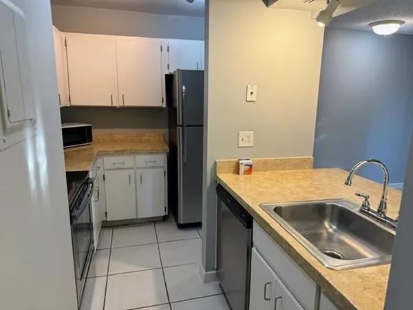 a utility room with washer and dryer