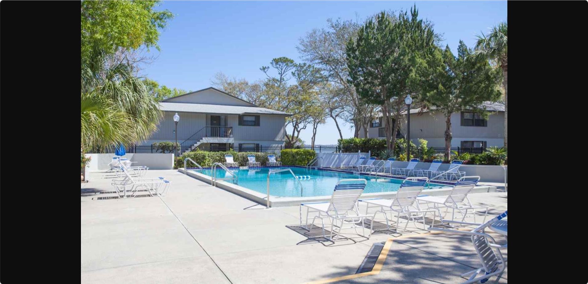 8 Alcira Court St. Augustine, FL 32086 - Photo 5 of 13 a view of house with outdoor space and sitting area