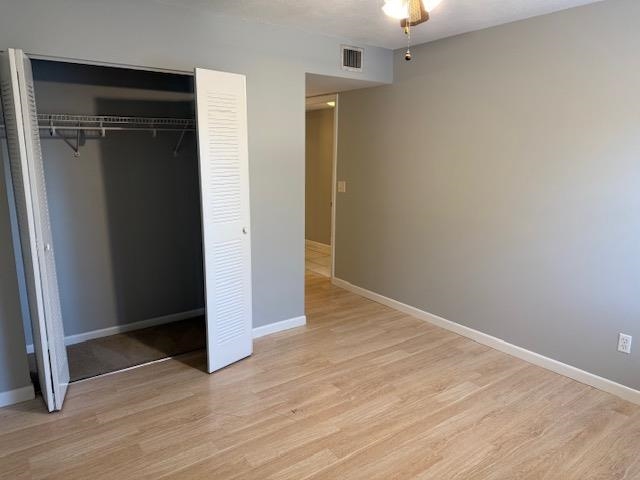 8 Alcira Court St. Augustine, FL 32086 - Photo 10 of 13 an empty room with wooden floor closet and windows