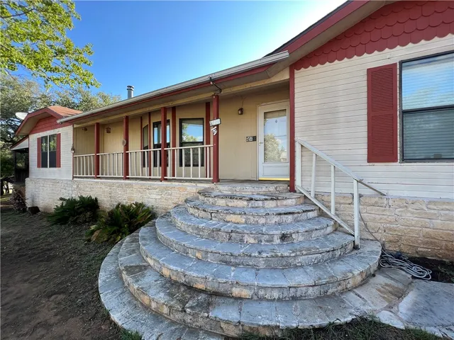a view of a house with entertaining space