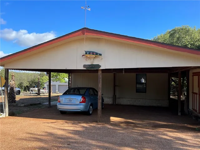 a car parked in front of a house