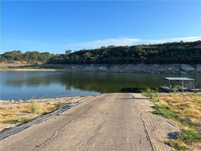 a view of a lake with a mountain in the background