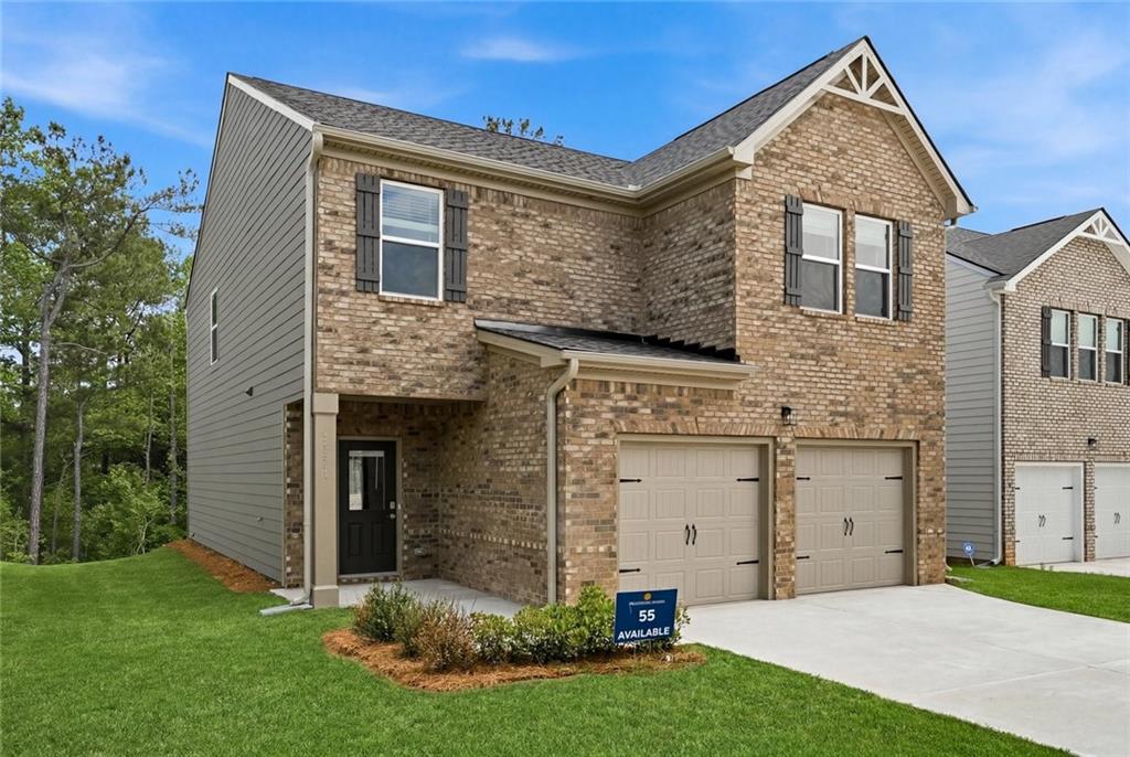 5351 Tolar Road South Fulton, GA 30213 - Photo 2 of 30 front view of a house with a yard