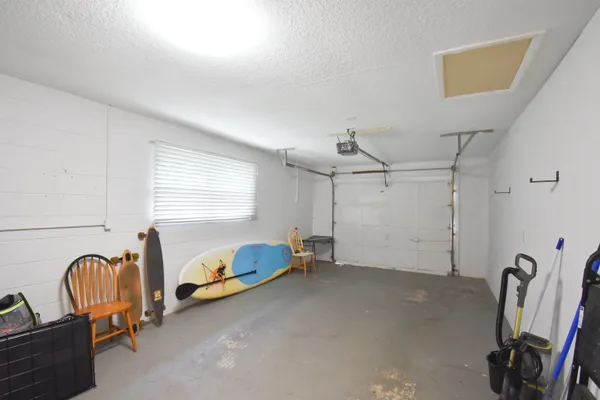 a view of house with a big yard