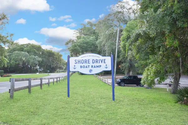 a view of a lake with a big yard