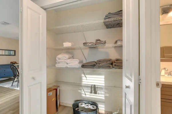 a kitchen with a refrigerator and a stove