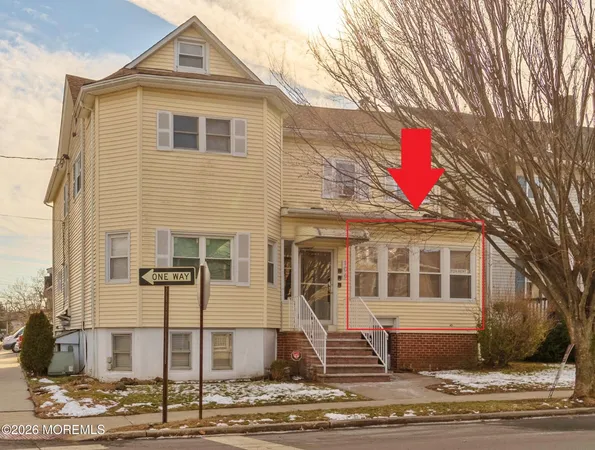 a front view of a house with street