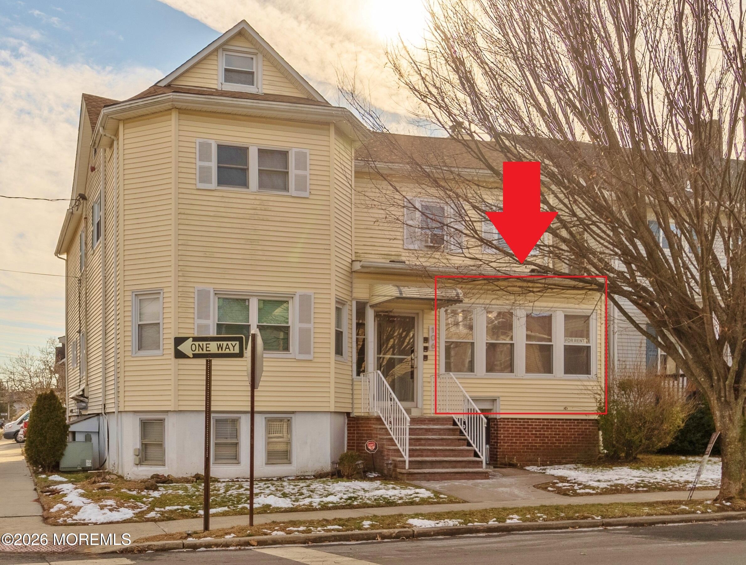 106 Wallace Street, Unit B Red Bank, NJ 07701 - Photo 2 of 20 a front view of a house with street