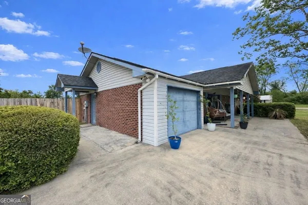 a view of a house with a patio