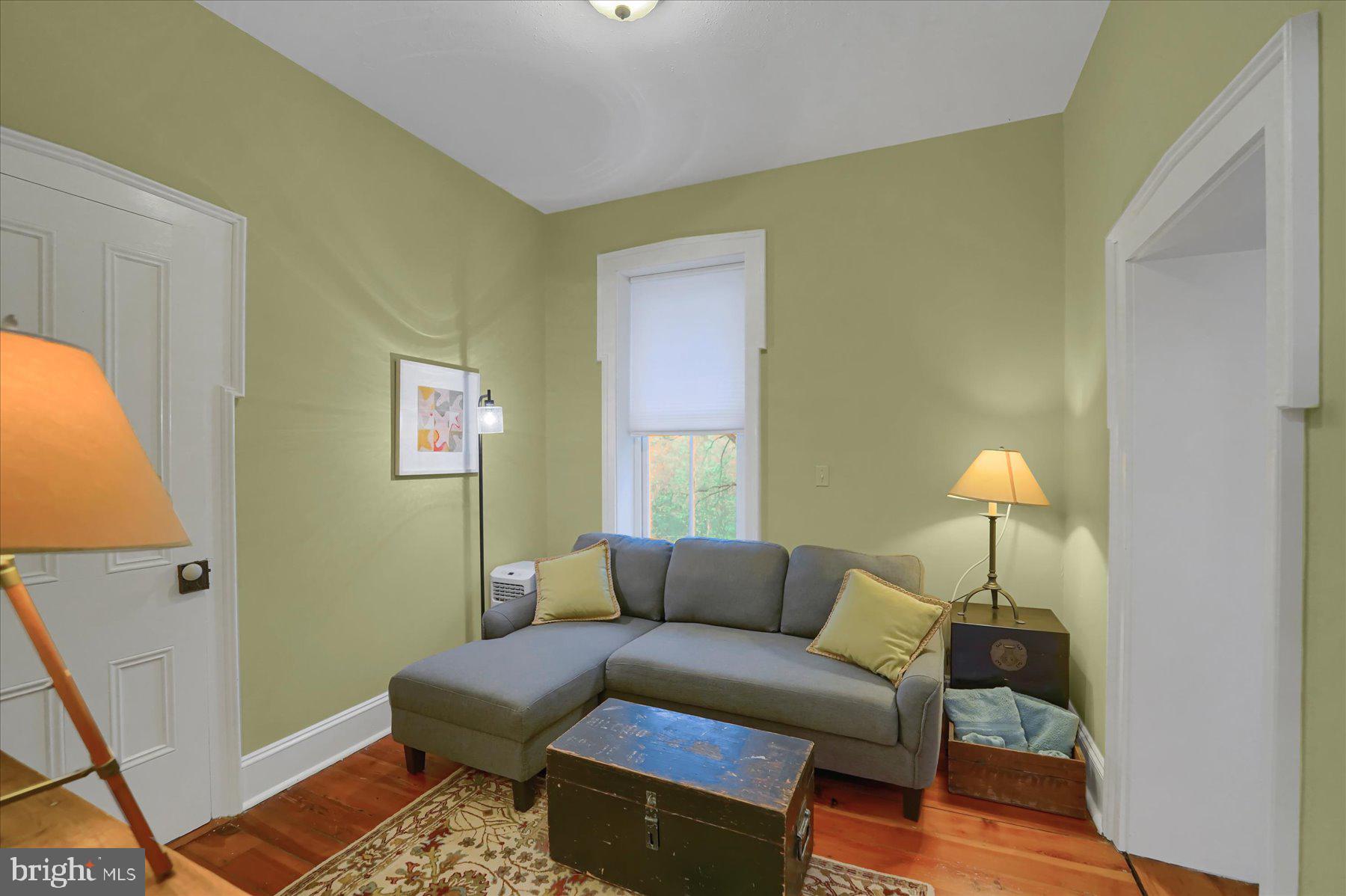 612 Old Rte 322 Spring Mills, PA 16875 - Photo 35 of 78 a living room with furniture and a window